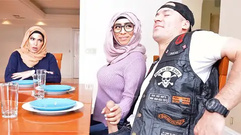 Hijab-wearing Damsel Providing A Handjob From Under The Table